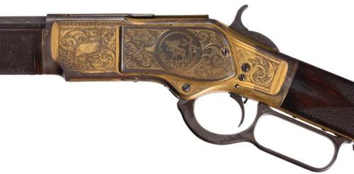 Winchester Model 1873 “1 of 1,000″ lever action rifle engraved by John Ulrich.Sold at Auction: $414,