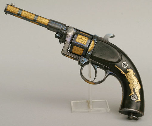 Ornate gold decorated Devisme revolver, crafted by Devisme a Paris, circa 1860.