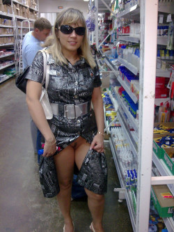 beachdancer:  blond babe flashing her pussy in the hardware store