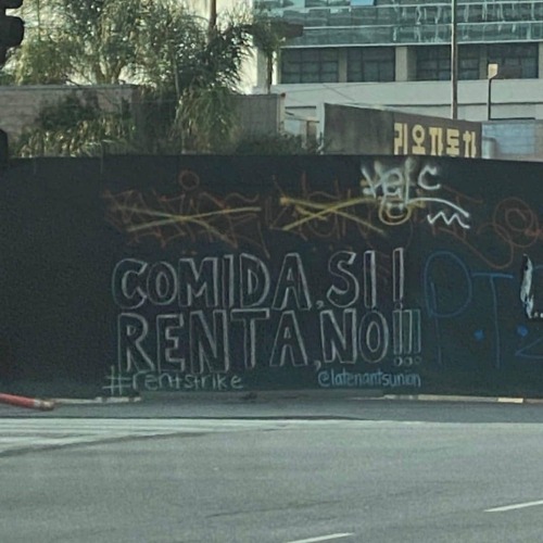 “Food, Yes! Rent, No!!” Rent strike graffiti seen in Los Angeles, California