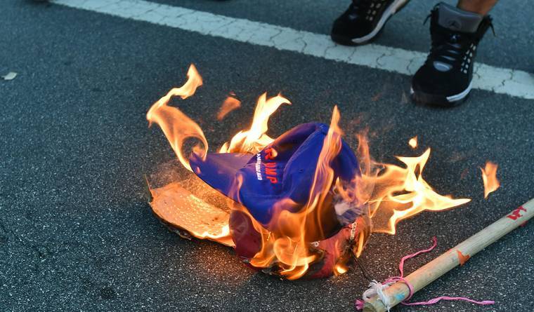 blackpantha:  rayhn:  micdotcom:  Donald Trump supporters were beaten and pelted