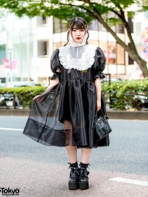 18-year-old Mami on the street in Harajuku wearing a sheer monochrome dress - with horror hands embr