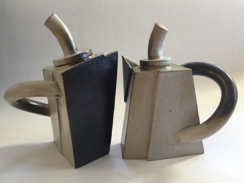 Black and white angular teapots.