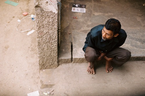 India 2013: A photo of a man sitting down taken from the bus to Mysore, Karnataka. 50mm, Nikon F4S, 