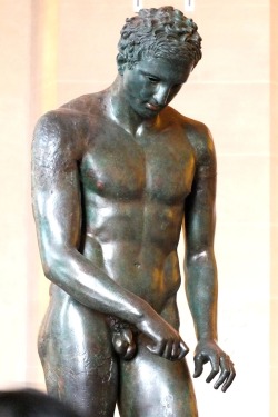 m1male2:The Approximate of Croatia, bronze statue, 2nd-1st centuries BC.  Apoxyomenos is one of the conventional subjects of Greek votive sculpture, depicting an athlete in the act of wiping sweat and dust from his body with the small curved instrument