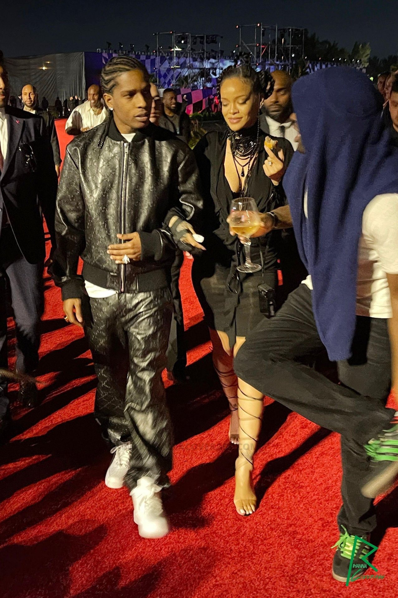 the floor is covered in champagne — Rihanna and A$ap Rocky attend the Louis  Vuitton