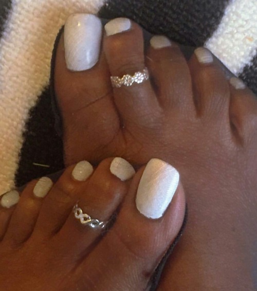 tony6110:The beautifully painted, nylon covered toes of @k_fancy_feet