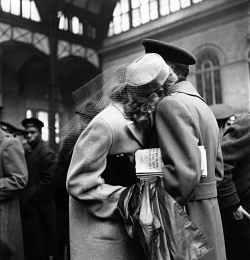 onlyoldphotography:  Alfred Eisenstaedt: Couple in Penn Station sharing farewell embrace before he ships off to war during WWII, 1943 