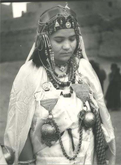Moroccan fashion1. Moroccan woman, 1936, by Jean Besancenot6. Morrocan jellaba, long hooded unisex o