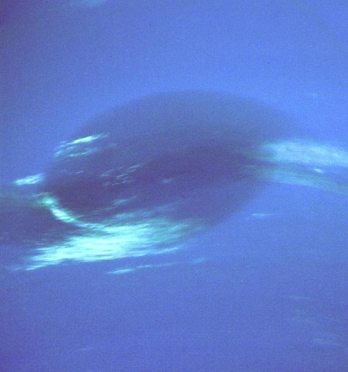 This photograph of Neptune was reconstructed from two images taken by Voyager 2’s narrow-angle