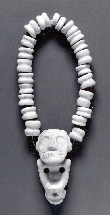 Taíno necklace with pendant figure (13th – 15thcentury, Dominican Republic), made of stone.  It is 4