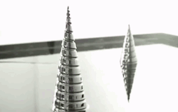 sixpenceee:  sixpenceee:  merry christmas guys ! here’s some ferrofluid going into the shape of a christmas tree when placed in contact with a magnet.  have a great day    and here’s the first christmas post I made on this blog in 2013. MERRY