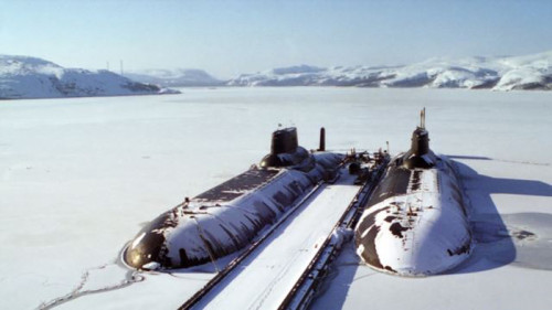 Russian nuclear-powered submarines carry fourth-generation ballistic missiles, seen at a naval base 