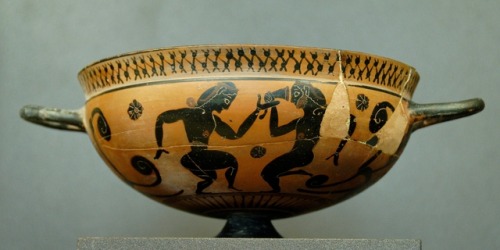 Scene of a komos (drunken revel).  Attic black-figure komast cup, attr. to the Falmouth Painter; ca.