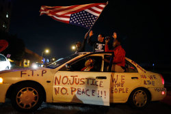 politics-war:  Protesters wave an upside-down