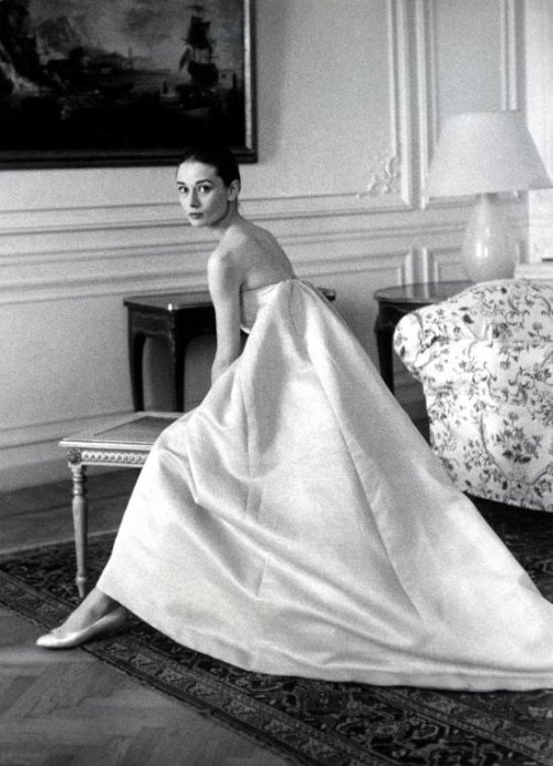 soaudreyhepburn:  On April 26, 1958 Audrey Hepburn wears a pale lavender gown Hubert de Givenchy, during a fitting session with the designer in Rome