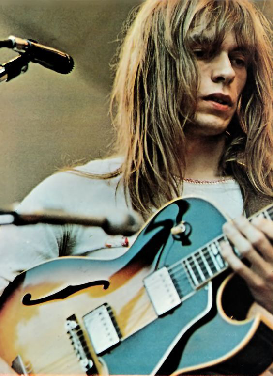 RockAndRollPicsAndThings — Steve Howe of Yes onstage, page from dutch...