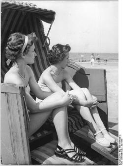 Tourists in a strandkorb on Darss peninsula,