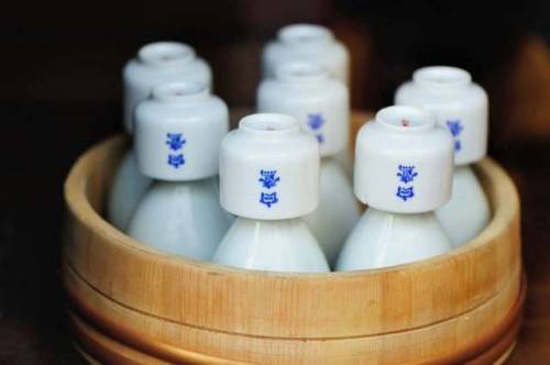 Not sure why I remember this, but I took this shot of sake bottles and cups displayed in the window 