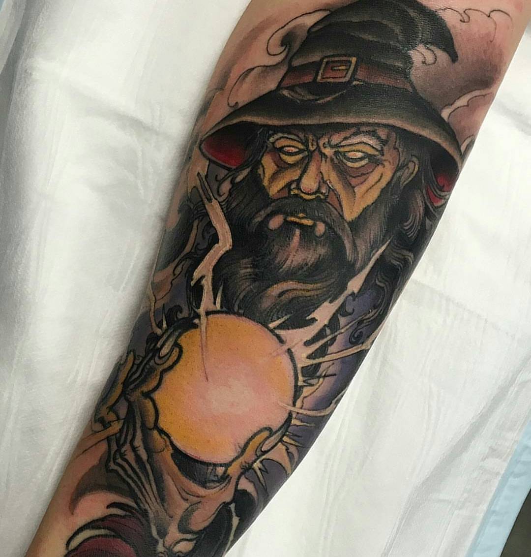 Black Ink Wizard With Stick Tattoo Design Image – Truetattoos