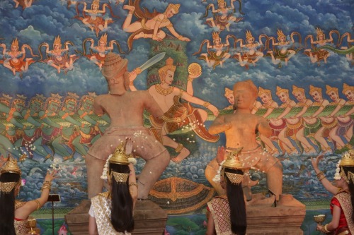 Cambodian dancers perform a blessing dance near the three pieces of the 10th century Cambodian sands