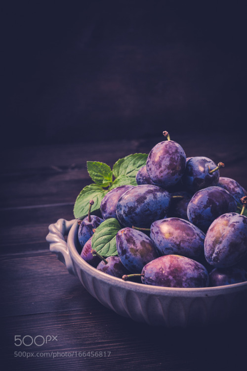 Plums in a bowl by ChristianFischer2