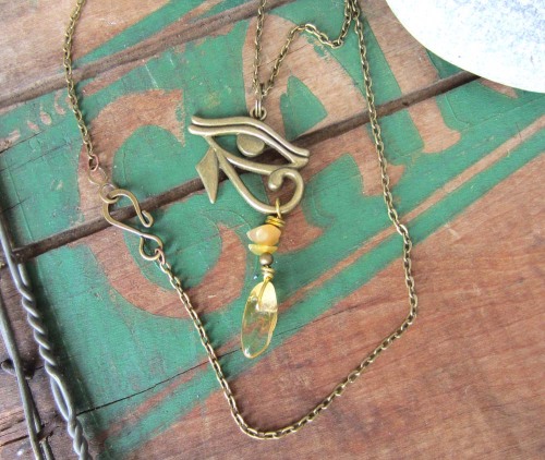 Protective Eye of Horus with Citrine. https://www.etsy.com/listing/183225466/eye-of-horus-necklace-p