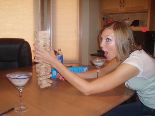 An extraordinary strip jenga game - the girl ends up down to a bra and very sexy panties, and the in