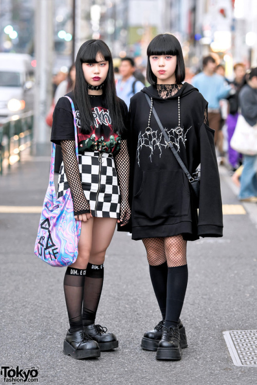 Japanese high school students Sarah (17) and Saki (15) on the street in Harajuku. Sarah is wearing v