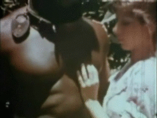 kittyqwest:  Some vintage interracial porn.  She’s all hot reading about the new
