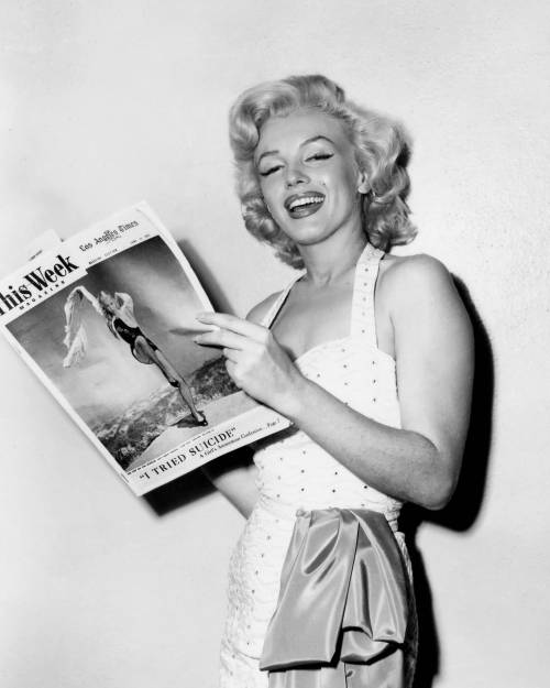 Marilyn Monroe photographed backstage of her handprint ceremony at the Grauman’s Chinese Theatre on 