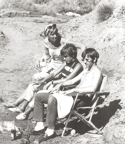 Cynthia Powell-Lennon, Maureen Starkey and Ringo Starr watch as John films scenes of “How I Won the 