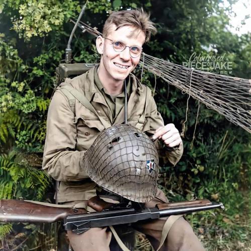 theroadgoesonforever:oldschoolpic:  A smiling and lucky to be alive Tech Sgt. Meredith J. Rogers, 30 from Sunburst, NC shows how lucky he is when his helmet was punctured by a sniper’s bullet during fighting in Normandy with the US 2nd Infantry Division,