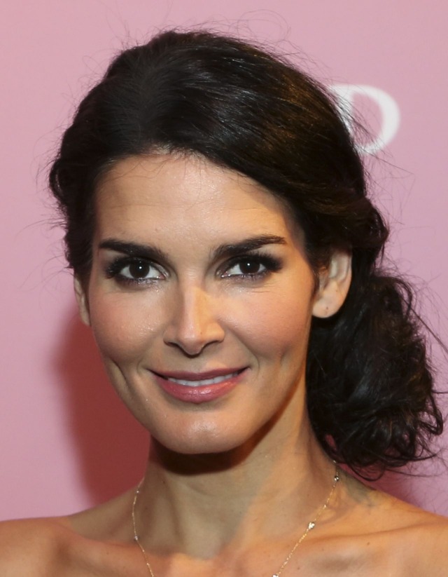 Angie Harmon poses with the Spotlight Award at SCAD's aTVfest on February 7, 2014 in Atlanta, Georgia.