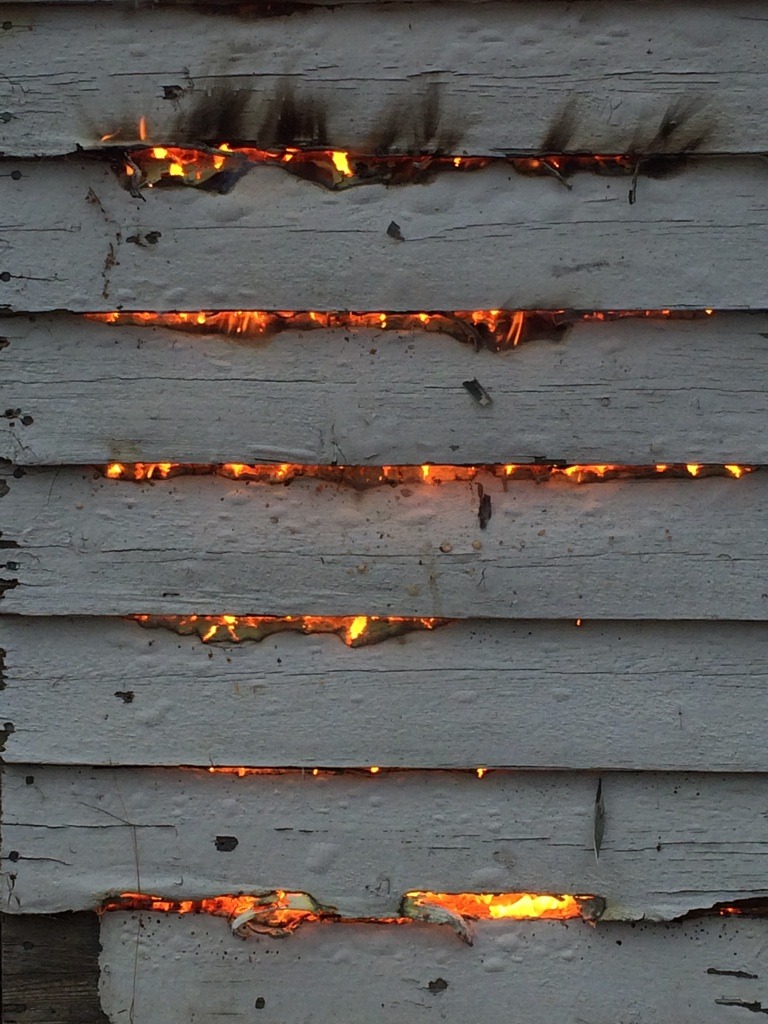 godotal:  Fire trying to eat its way through a wall 