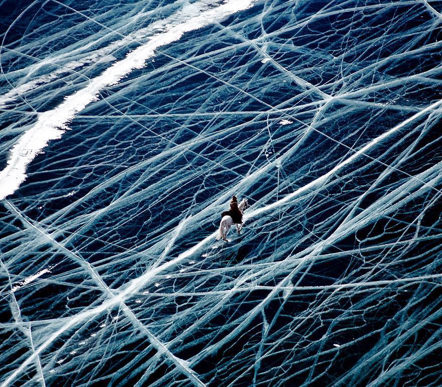 the-gasoline-station:  When a Super-Clear Lake Freezes Over Southern Siberia’s