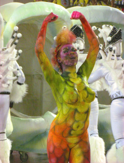 Topless and body painted at a Brazilian carnival, by Sergio seLusava