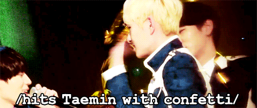 mvpnoona:forjongins:he’s the cutest of ‘em all.I love how childlike he looks when playing with confe