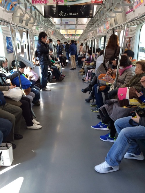 someangles:  On a train in Tokyo, Japan.