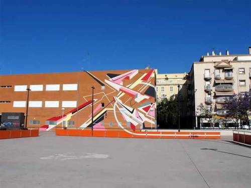 Catalan street artist Elbi Elem:a) at L’Hospitalet de Llobregat, Barcelona, Cataloniab) high wall in