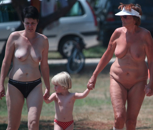mixedgendernudity:  Three generations of nudists, but grandma is the only one bearing it all