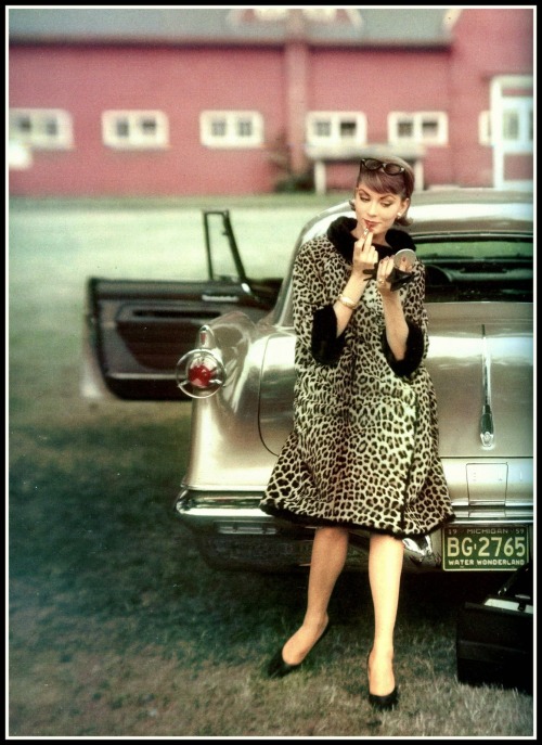 fawnvelveteen:  Mary McLaughlin standing in front of a Chrysler Le Baron, photo  by John Rawlings, V