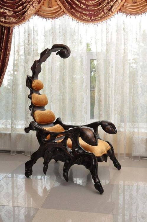 The Scorpion Chair designed and created by Russian woodcarver, sculptor, and painter, Vyacheslav Pak