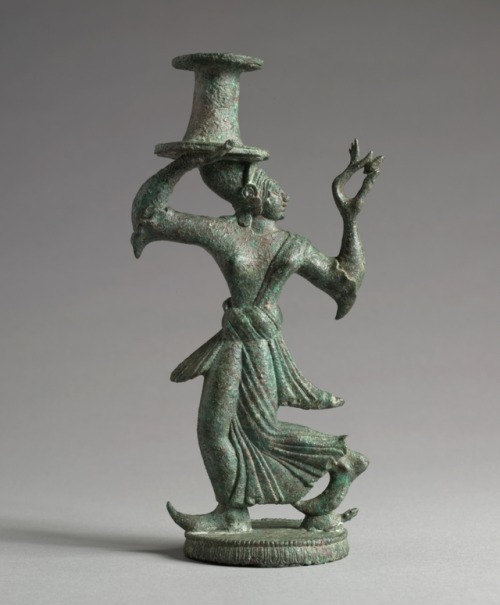 theancientwayoflife:~ Candelabrum Stand of a Dancing Maenad. Date: 525-500 B.C. Place of origin