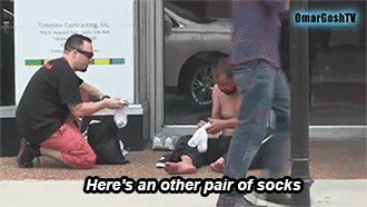sizvideos:  Giving The Homeless New Shoes and Shirt Off Back - Video 