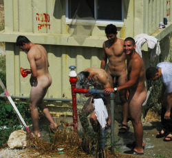 watchout12345:  notashamedtobemen:  Soldiers wash up outdoors.  Watch this.   