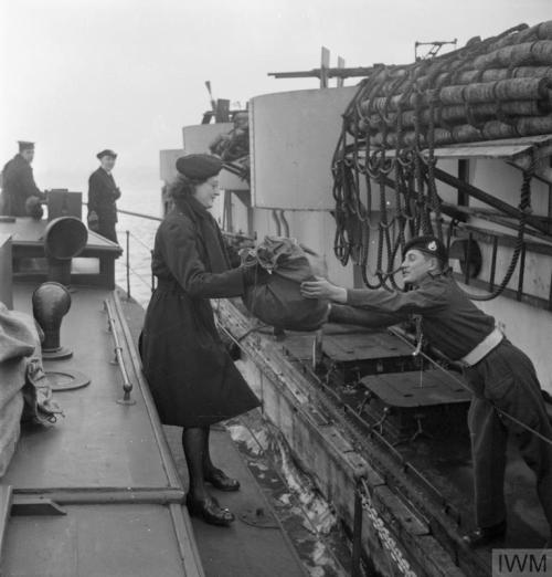 WRNS with the Fleet Mail (England, November 1944):Just visible through the grid of sorting compartme