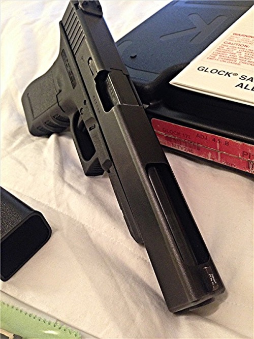 pistolmars:  gunrunnerhell:  Glock 17L The “longslide” version of the Glock 17, it features a 6” long barrel and slide with a cut out at the top. This serves two purposes; to reduce weight but also allows for the option to port the barrel. The 17L