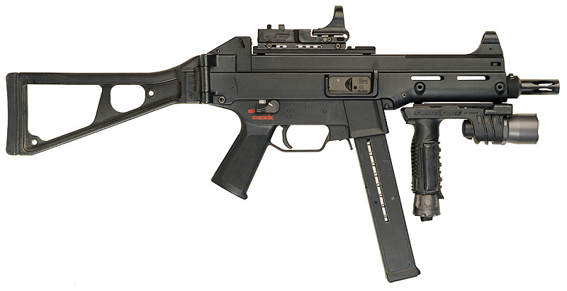 war-tools:  Heckler &amp; Koch UMP45 - .45 ACP fitted with a C-More red dot sight