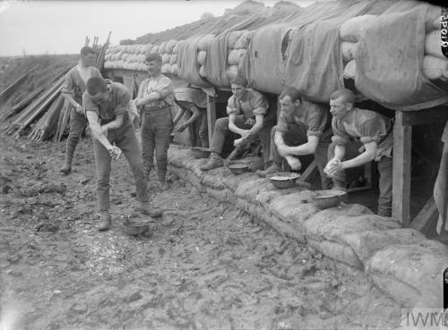 British troops using their tin helmets as wash bowls at Ovillers, September 1916.